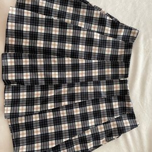 Plaid skirt. Has shorts built in. Never been worn. Great condition.